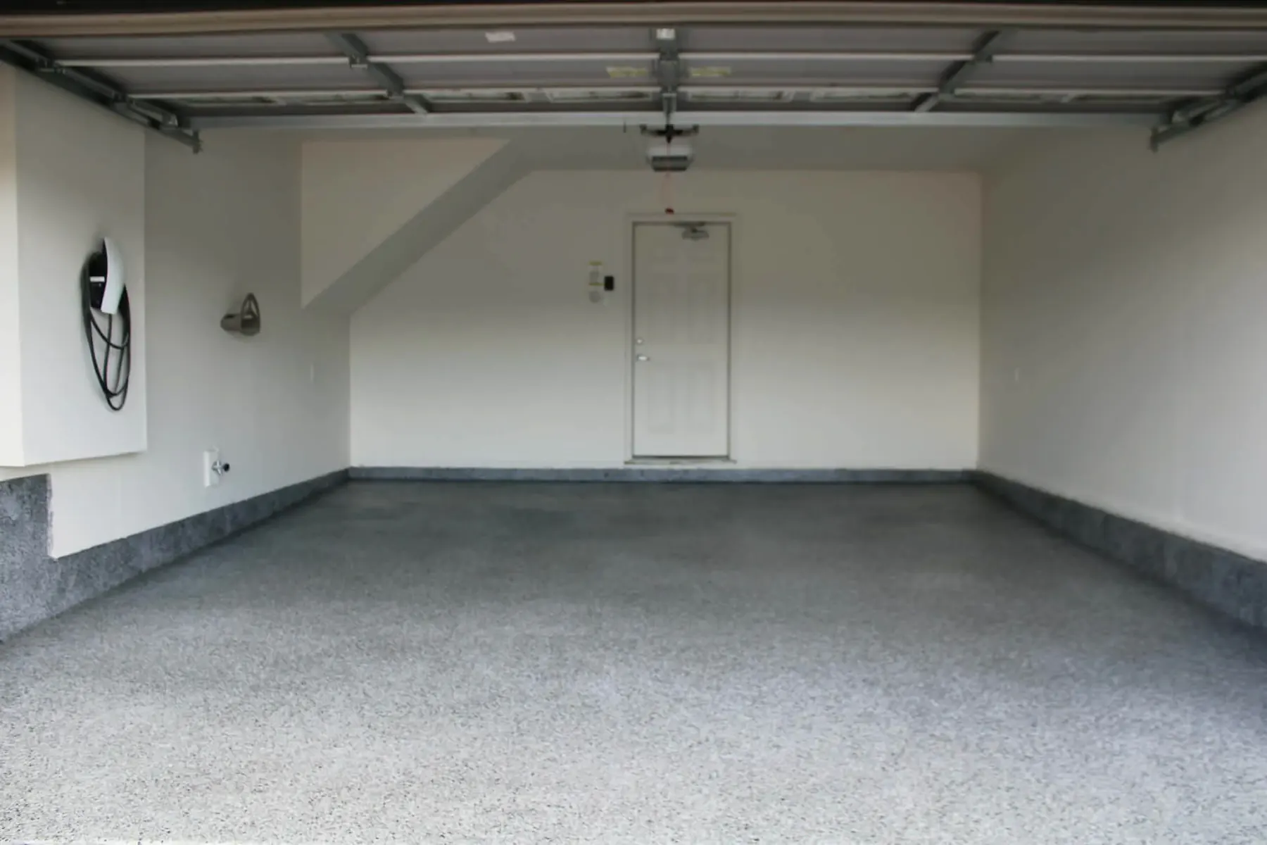 Finished grey flake garage floor by Lumix Coatings